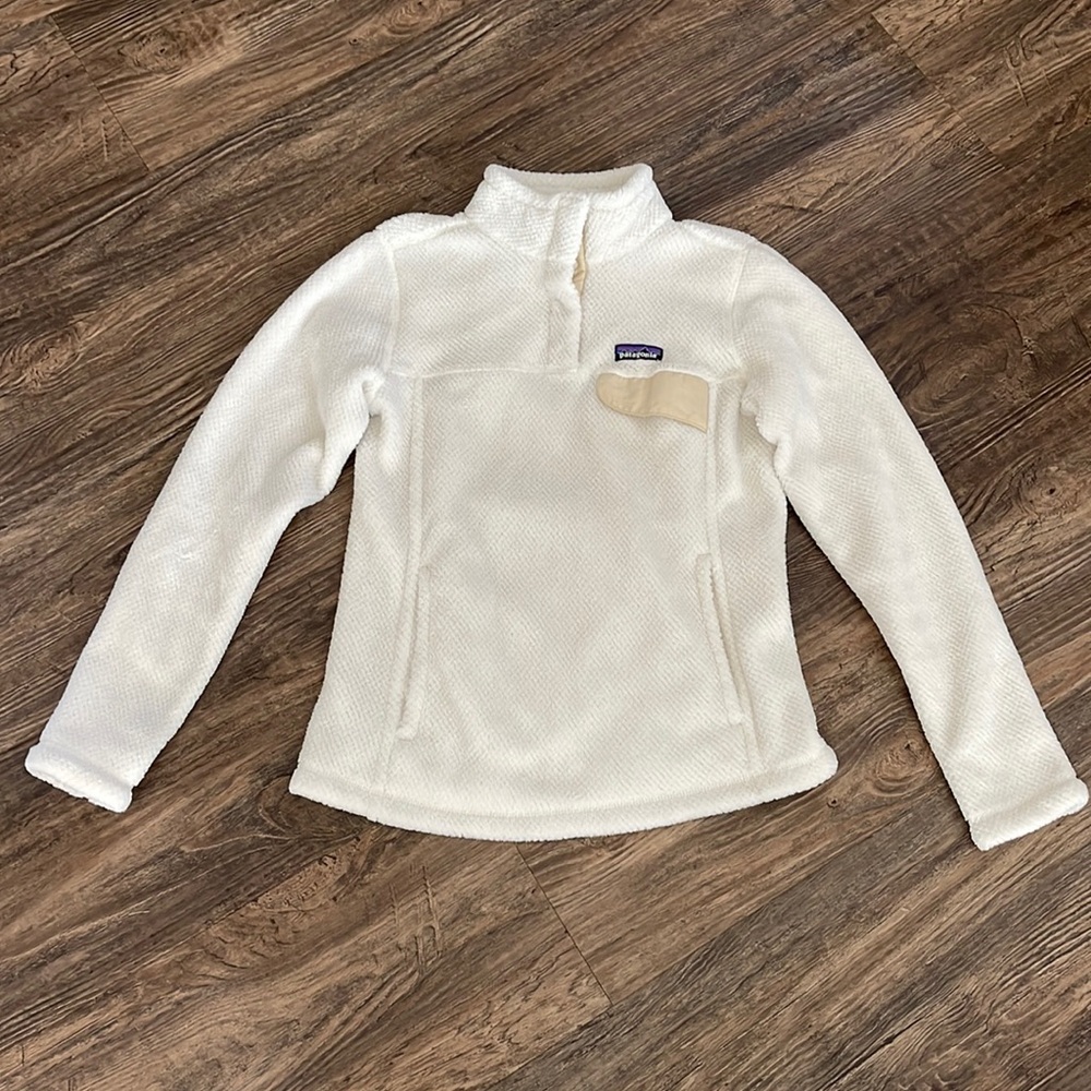 Patagonia women’s cream sweatshirt.